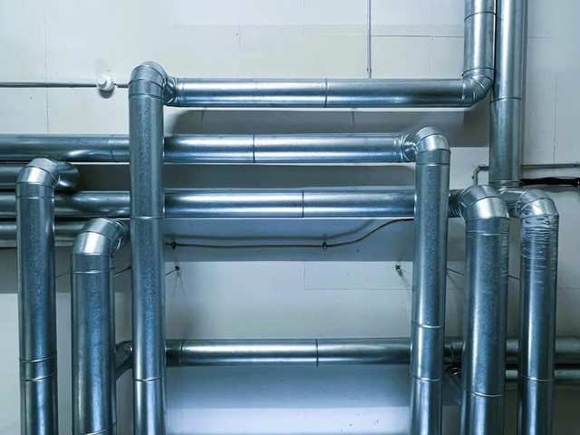 Copper pipework under a sink
