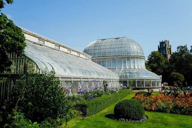 Glass conservatory with roof sections