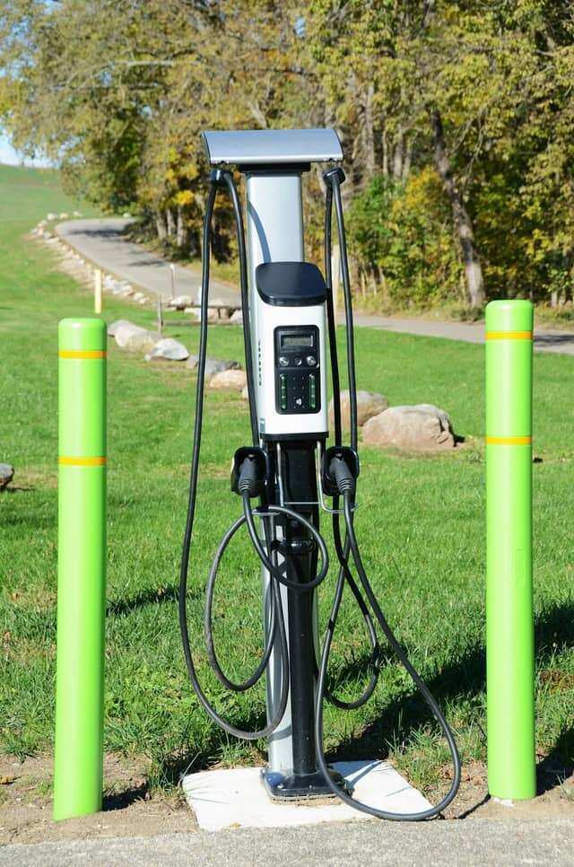 Charging cables arranged beside technical equipment