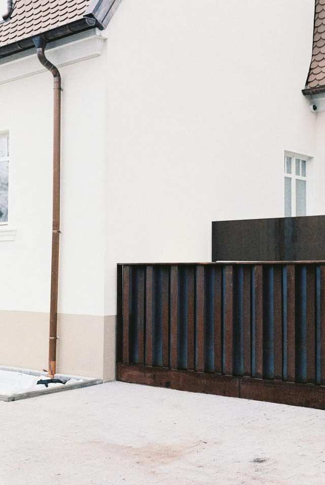 House exterior with a downspout