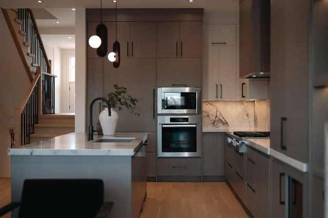 Modern fitted kitchen with cabinets and worktop