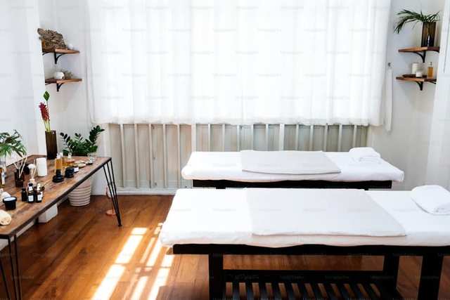 Physiotherapy treatment room with therapy tables
