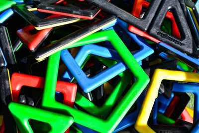 Colourful wooden building blocks arranged together