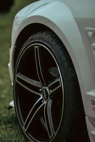 Close-up of a car tyre and alloy wheel